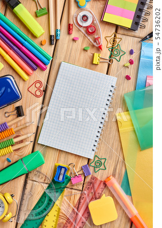 Blank notebook and colorful stationery supplies. Blank notebook and colorful stationery supplies. 54736202