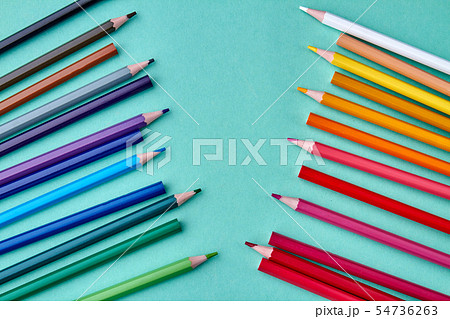 Composition with multicolored pencils on color background. 54736263