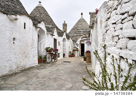 Old trulli houses in Alberobello town in Italy Old trulli houses in Alberobello town in Italy 54736384