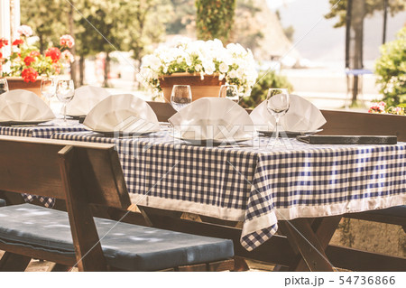 Serving at a European restaurant on street 54736866