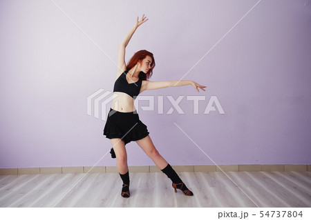 Beautiful and young girl in a gym 54737804