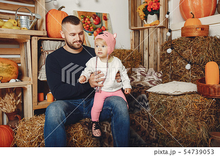 Happy father sitting with his little daughter Happy father sitting with his little daughter 54739053