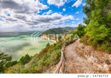 Picturesque islets Faraglioni di Puglia in summer Picturesque islets Faraglioni di Puglia in summer 54740759