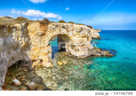 Picturesque seascape with cliffs, rocky arch at Picturesque seascape with cliffs, rocky arch at 54740799