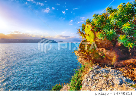 Dramatic spring sunset on the the cape Milazzo 54740813