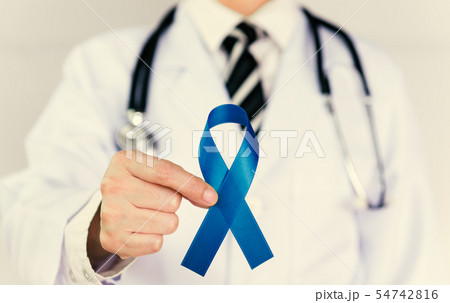 Doctor Holds Blue Ribbon Doctor Holds Blue Ribbon 54742816
