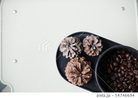 Top view of coffee beans and cone pine Top view of coffee beans and cone pine 54746694