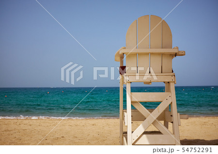 A lifeguard's chair on the beach. A lifeguard's chair on the beach. 54752291