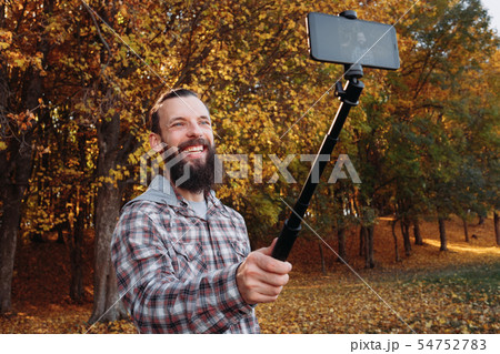 fall forest male tourist selfie nature foliage fall forest male tourist selfie nature foliage 54752783