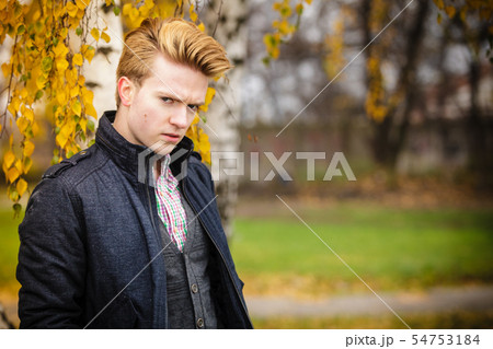 Young handsome man outdoors 54753184