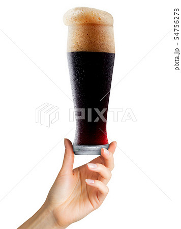 Woman hand holding mug of beer with foam on white background 54756273