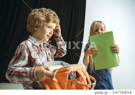 Boy and girl preparing for school after a long summer break. Back to school. 54756858