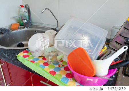 Tableware and dishware drying on towel.Clean 54764279