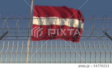 Waving flag of Latvia behind barbed wire fence. Conceptual 3D rendering Waving flag of Latvia behind barbed wire fence. Conceptual 3D rendering 54770223