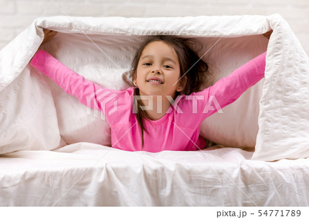 happy morning baby in bed. 54771789