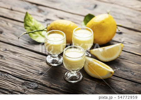 Traditional Italian liguore with lemon Traditional Italian liguore with lemon 54772959