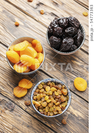 Concept of healthy meal with dried fruits 54773363