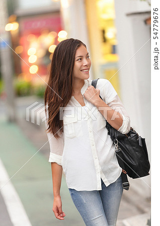 Shopping woman walking in Harajuku street, Tokyo 54779676