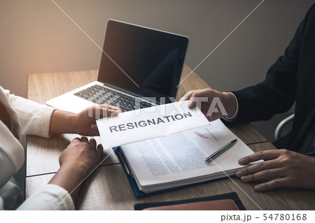 Male employee handed out a resignation envelope to Male employee handed out a resignation envelope to 54780168