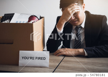 Male employee is stressed or angry while he is 54780181