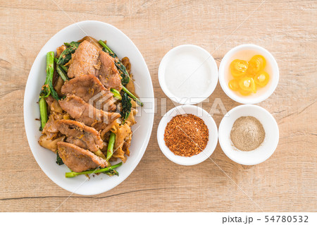 fried noodles with soy sauce and pork 54780532