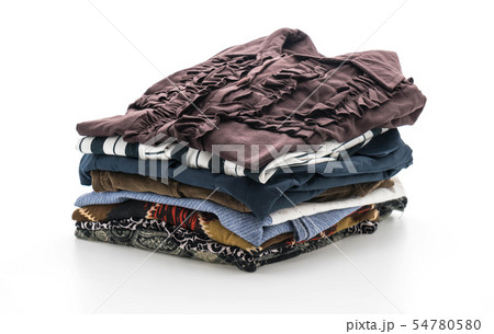 stacks of clothing on white 54780580