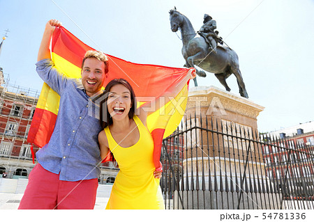 Madrid people showing Spain flag on Plaza Mayor 54781336