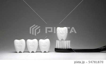 Happy Tooth and black toothbrush, teeth will good  54781870