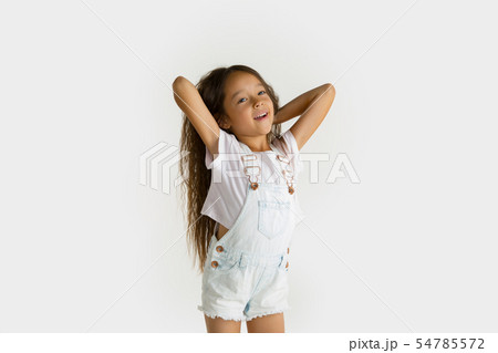 Portrait of little girl isolated on white studio background Portrait of little girl isolated on white studio background 54785572