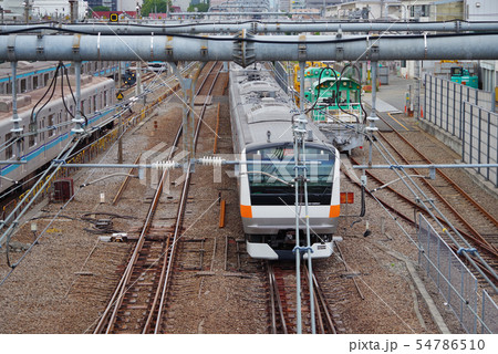 三鷹車両センター付近を往来する中央線 三鷹車両センター付近を往来する中央線 54786510