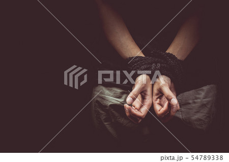 Hands of a missing kidnapped victim 54789338