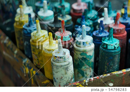 Closeup dirty plastic bottles contain water color Closeup dirty plastic bottles contain water color 54798283