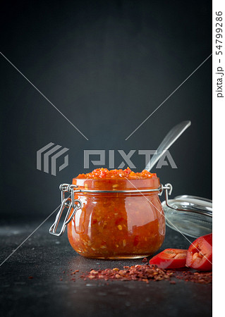Traditional adjika hot chili pepper sauce paste. 54799286