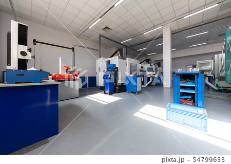 an interior shot of producing line of metal parts in modern plant 54799633