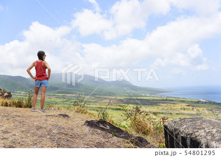 Hiking travel woman looking at St Kitts landscape 54801295