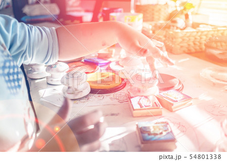 boy is having fun while playing with stamps boy is having fun while playing with stamps 54801338