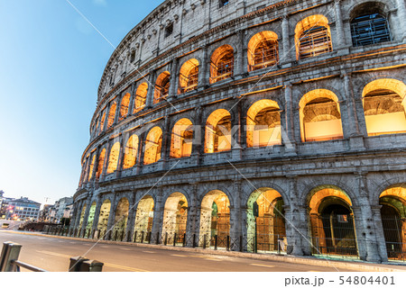 Colosseum, or Coliseum. Illuminated huge Roman amphitheatre early in the morning, Rome, Italy Colosseum, or Coliseum. Illuminated huge Roman amphitheatre early in the morning, Rome, Italy 54804401