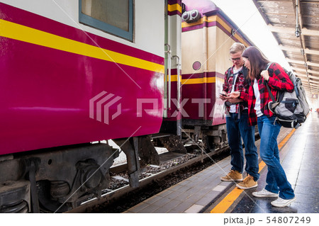 Happy young couple travellers together on vacation Happy young couple travellers together on vacation 54807249