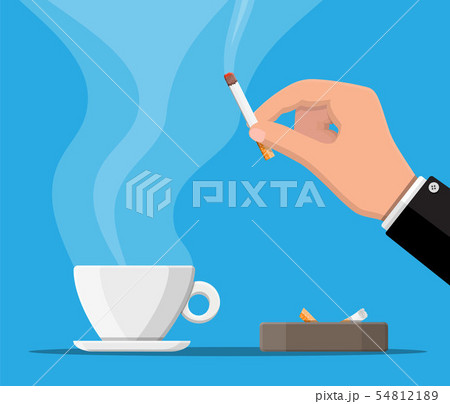 Coffee cup and ashtray full of smokes cigarettes. 54812189