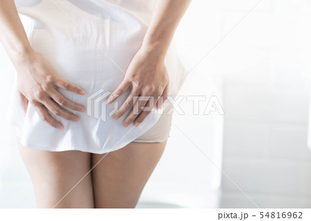Close up woman stomachache with toilet Close up woman stomachache with toilet 54816962