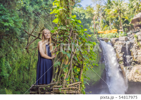 Bali trend, straw nests everywhere. Young tourist enjoying her travel around Bali island, Indonesia Bali trend, straw nests everywhere. Young tourist enjoying her travel around Bali island, Indonesia 54817975