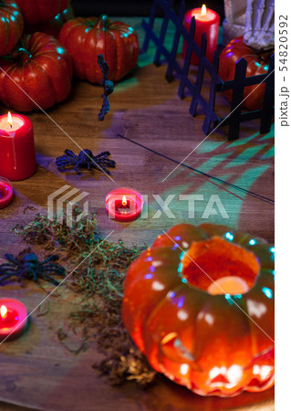 Top view of carved orange pumpkin with evil face 54820592