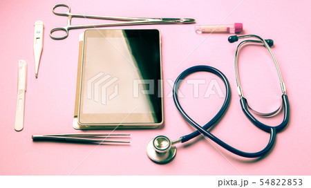 Tablet pc and doctor tools on blue surface 54822853