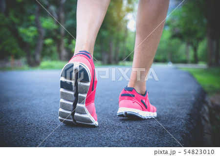 Close up shoes, legs. sport runner woman back view Close up shoes, legs. sport runner woman back view 54823010