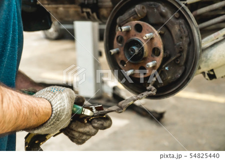 Photo of repair of a running gear of the car hands 54825440