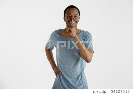 Portrait of young man isolated on white studio background 54827316