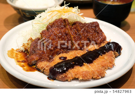 miso sauce top with tonkatsu on white dish miso sauce top with tonkatsu on white dish 54827963