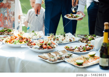catering services background with snacks on guests table outdoor wedding party 54828635
