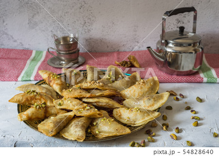 Arabic Traditional dessert Qatayef or Atayef Arabic Traditional dessert Qatayef or Atayef 54828640