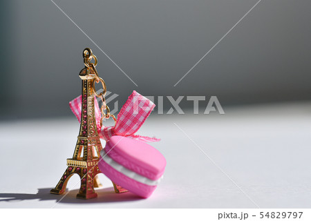 Souvenir golden eiffel tower with a purple heart Souvenir golden eiffel tower with a purple heart 54829797